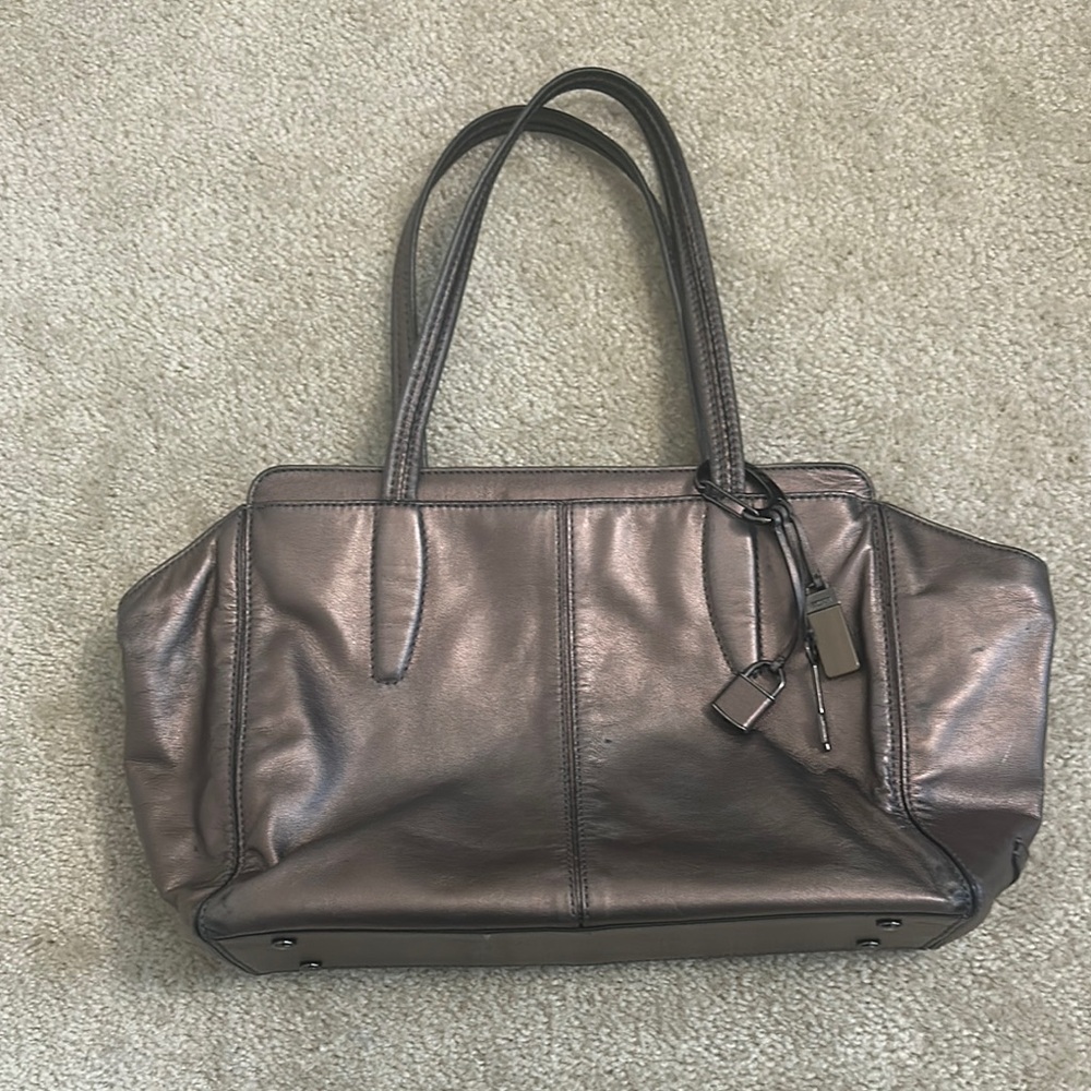 Tumi Women’s metallic travel tote bag